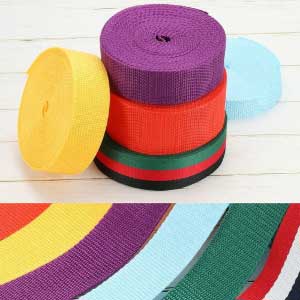 Close-up of durable polypropylene webbing in assorted colours for industrial use