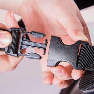 Heavy-duty side release buckle on black webbing